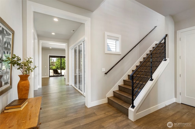8784 NE Winslow Grove Ct, Bainbridge Island, WA 98110 - stairway with wood finished floors and recessed lighting