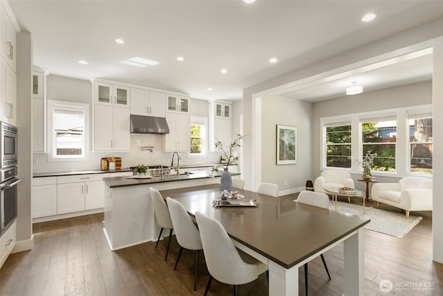 8784 NE Winslow Grove Ct, Bainbridge Island, WA 98110 - dining area featuring recessed lighting and wood finished floors