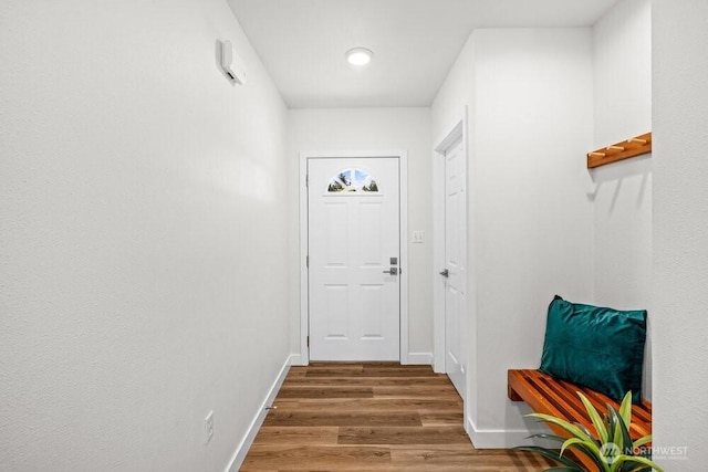 491 Pebble Beach Dr, Cle Elum, WA 98922 - doorway to outside featuring wood finished floors and baseboards