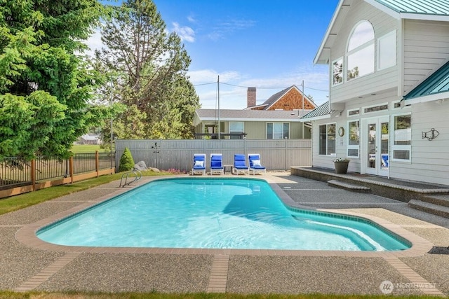 491 Pebble Beach Dr, Cle Elum, WA 98922 - view of swimming pool with a fenced backyard, a patio area, and french doors