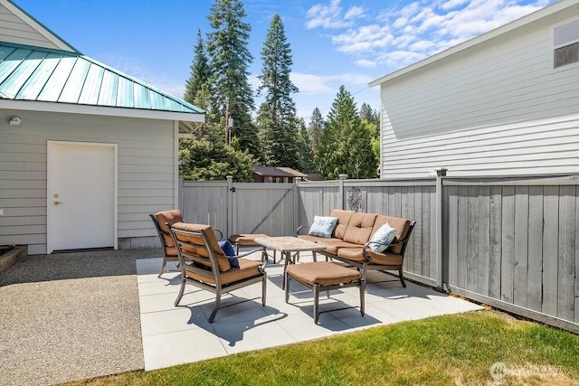 491 Pebble Beach Dr, Cle Elum, WA 98922 - fenced backyard with a patio, an outdoor hangout area, and a gate