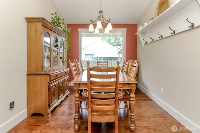 5117 77th St E, Tacoma, WA 98443 - dining area featuring a chandelier and wood finished floors