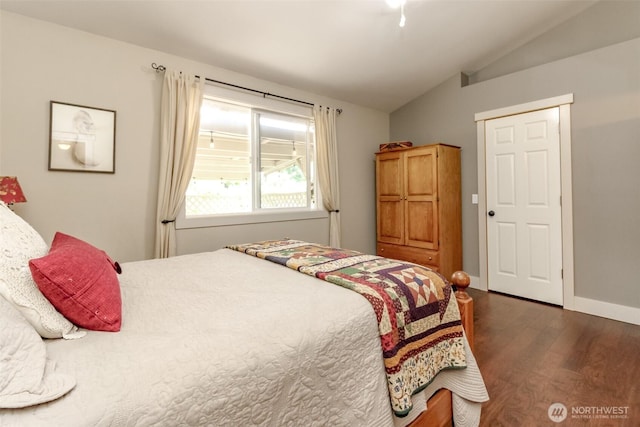 5117 77th St E, Tacoma, WA 98443 - bedroom with dark wood-type flooring and lofted ceiling