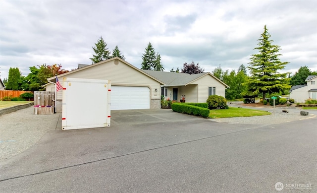 5117 77th St E, Tacoma, WA 98443 - single story home with a garage and driveway