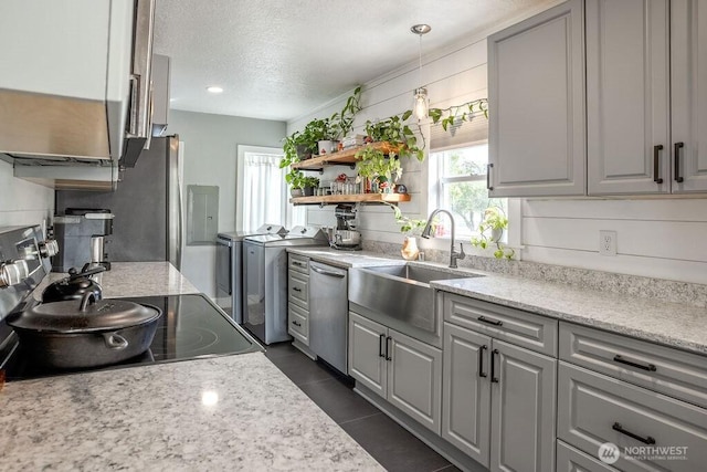 526 20th Ave, Longview, WA 98632 - kitchen featuring independent washer and dryer, dishwasher, open shelves, a textured ceiling, and gray cabinetry