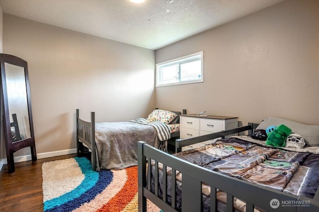 526 20th Ave, Longview, WA 98632 - bedroom featuring wood finished floors and baseboards