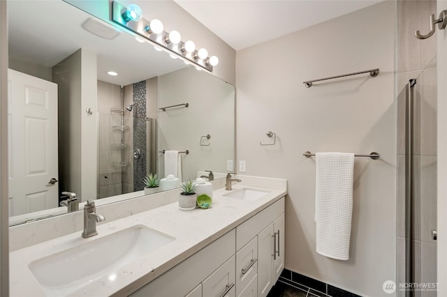 3116 164th St SW Unit 806, Lynnwood, WA 98087 - bathroom with double vanity, tiled shower, and tile patterned flooring