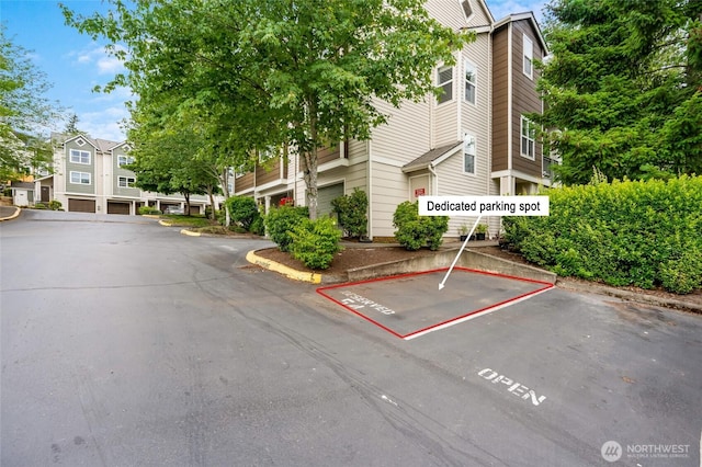 3116 164th St SW Unit 806, Lynnwood, WA 98087 - view of building exterior featuring uncovered parking