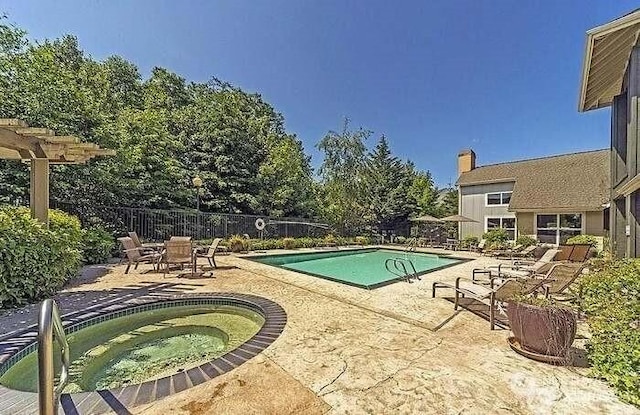 3116 164th St SW Unit 806, Lynnwood, WA 98087 - community pool featuring a hot tub and a patio area