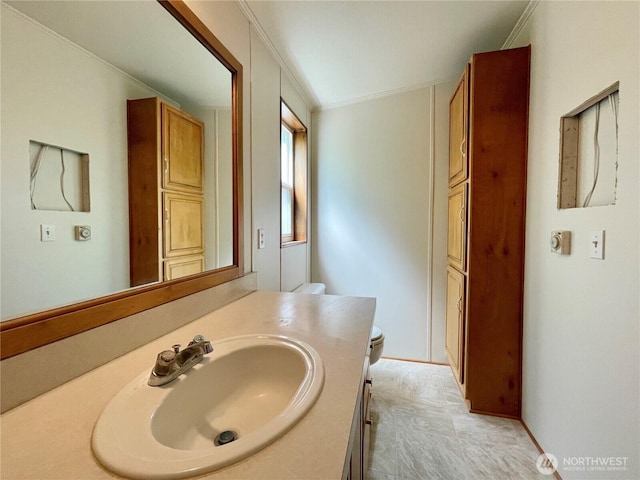 115 4th Ave SE, Soap Lake, WA 98851 - bathroom featuring vanity and crown molding