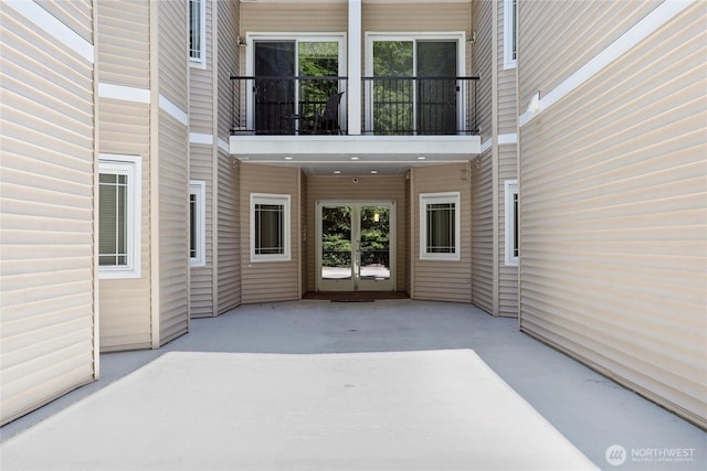 15000 Juanita Dr NE Unit 309, Kenmore, WA 98028 - view of patio featuring french doors