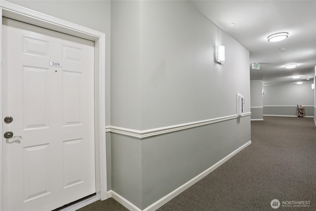 15000 Juanita Dr NE Unit 309, Kenmore, WA 98028 - corridor with baseboards and carpet flooring