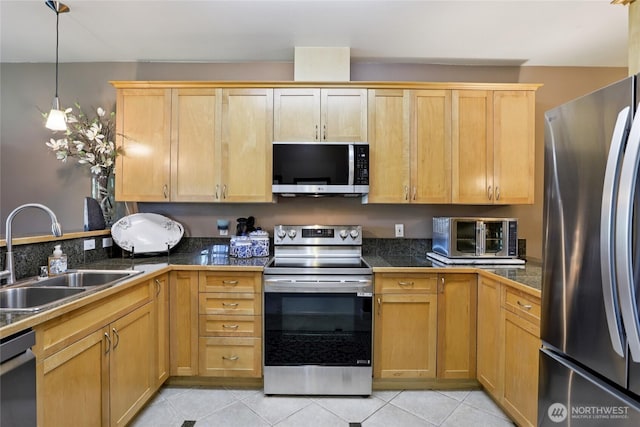 15000 Juanita Dr NE Unit 309, Kenmore, WA 98028 - kitchen featuring appliances with stainless steel finishes, tile countertops, pendant lighting, and light tile patterned flooring