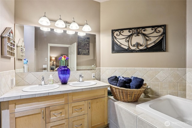 15000 Juanita Dr NE Unit 309, Kenmore, WA 98028 - bathroom with double vanity and a bath