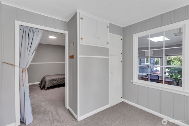 804 Electron Way, Fircrest, WA 98466 - unfurnished bedroom featuring ornamental molding, carpet flooring, and a decorative wall
