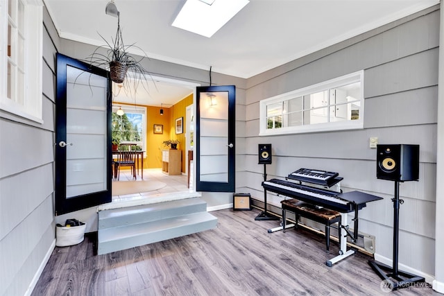 804 Electron Way, Fircrest, WA 98466 - misc room featuring wood finished floors, crown molding, and a skylight