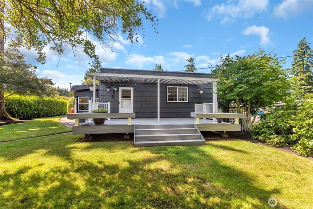 804 Electron Way, Fircrest, WA 98466 - rear view of house featuring a wooden deck and a lawn