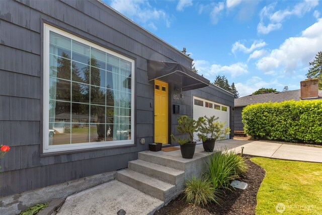804 Electron Way, Fircrest, WA 98466 - view of exterior entry featuring an attached garage