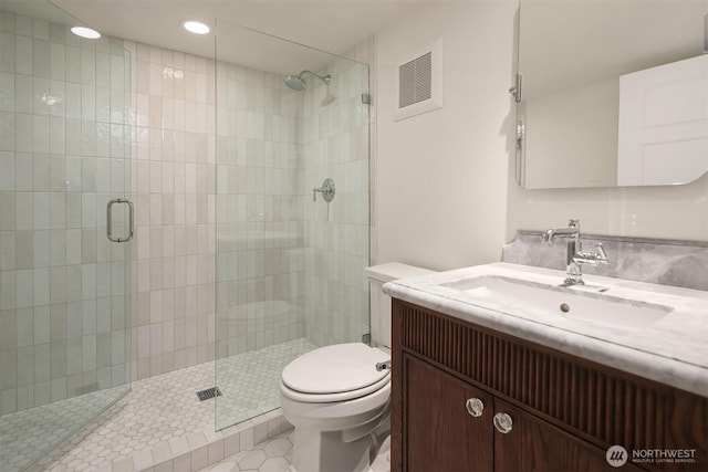 740 22nd Ave E, Seattle, WA 98112 - bathroom featuring vanity, tiled shower, tile patterned floors, and recessed lighting