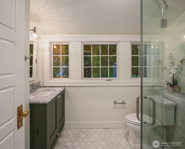 740 22nd Ave E, Seattle, WA 98112 - full bathroom featuring vanity, tile patterned flooring, and a stall shower