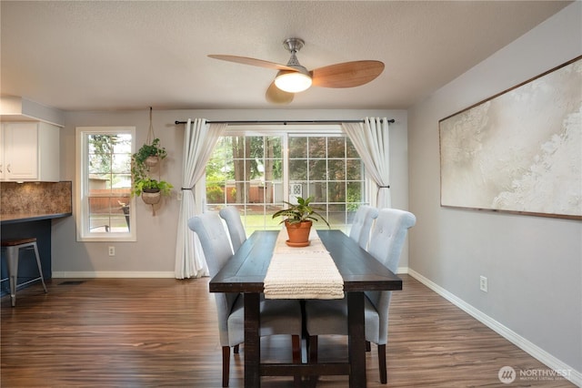 16420 92nd Avenue Ct E, Puyallup, WA 98375 - dining space featuring dark wood-style floors, ceiling fan, and a textured ceiling