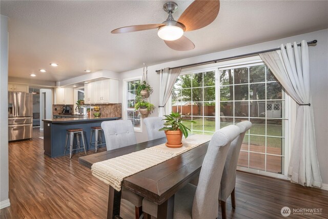 16420 92nd Avenue Ct E, Puyallup, WA 98375 - dining room featuring a ceiling fan, dark wood-type flooring, and recessed lighting