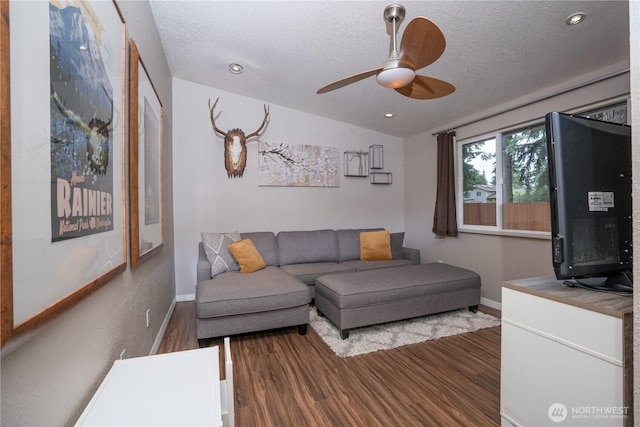 16420 92nd Avenue Ct E, Puyallup, WA 98375 - living room with wood finished floors, lofted ceiling, a textured ceiling, and ceiling fan