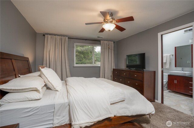 16420 92nd Avenue Ct E, Puyallup, WA 98375 - bedroom with ensuite bathroom, ceiling fan, and light colored carpet