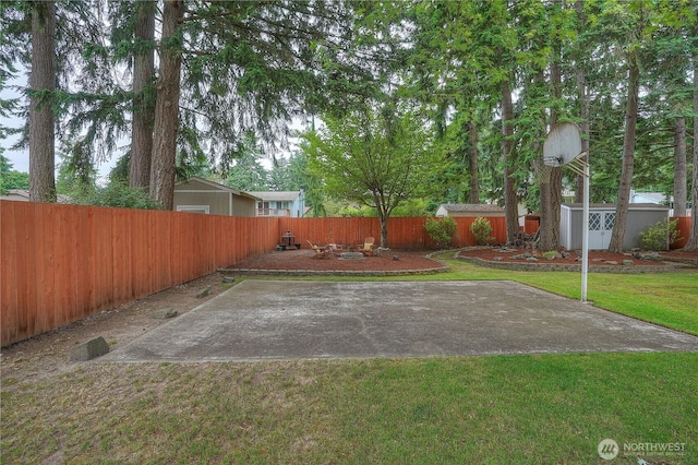 16420 92nd Avenue Ct E, Puyallup, WA 98375 - fenced backyard with an outbuilding
