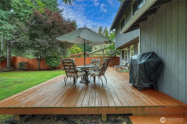 16420 92nd Avenue Ct E, Puyallup, WA 98375 - wooden deck featuring a fenced backyard, outdoor dining area, and grilling area