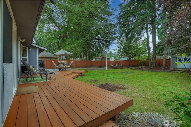 16420 92nd Avenue Ct E, Puyallup, WA 98375 - deck featuring a fenced backyard, outdoor dining area, and a shed