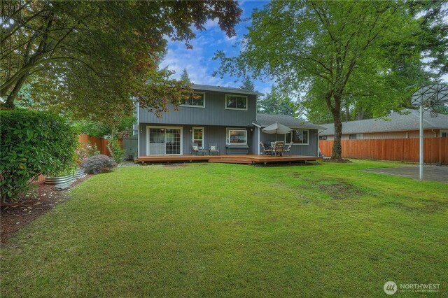 16420 92nd Avenue Ct E, Puyallup, WA 98375 - rear view of property with a wooden deck