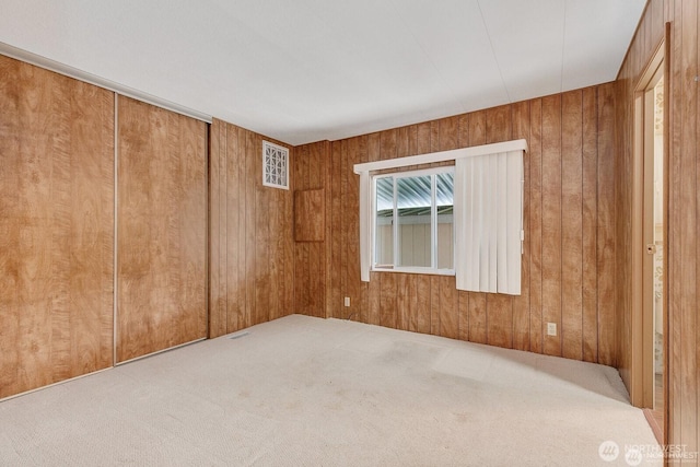 1415 84th St SE Unit 192, Everett, WA 98208 - spare room with carpet and wooden walls