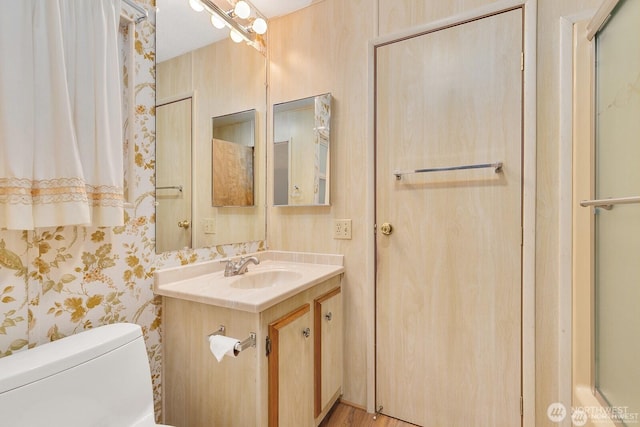 1415 84th St SE Unit 192, Everett, WA 98208 - bathroom featuring vanity and wallpapered walls