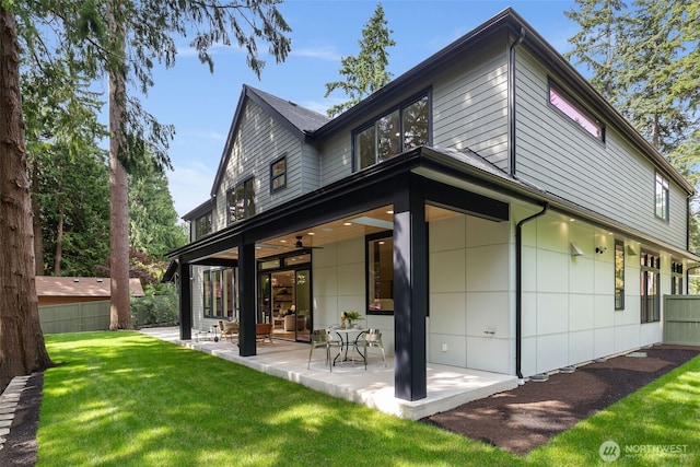 1806 154th Ave SE, Bellevue, WA 98007 - back of property with a patio and ceiling fan