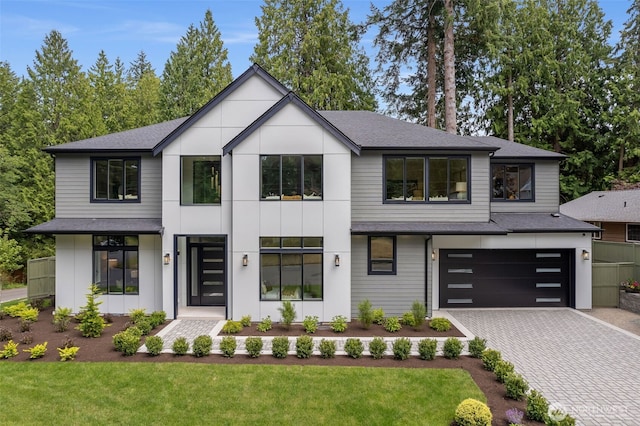 1806 154th Ave SE, Bellevue, WA 98007 - contemporary home with a garage, decorative driveway, roof with shingles, and a front yard