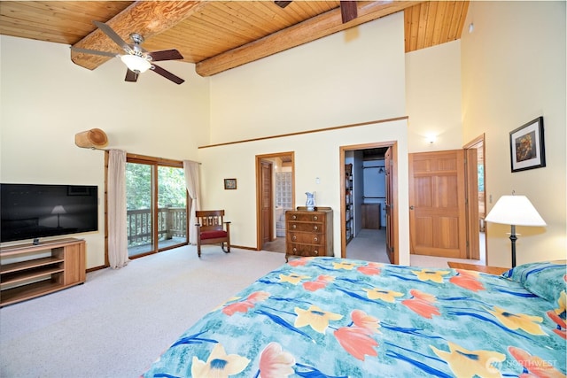 194 Protection Ridge Dr, Port Townsend, WA 98368 - carpeted bedroom featuring a wooden ceiling with exposed beams, access to outside, high vaulted ceiling, a ceiling fan, and ensuite bathroom
