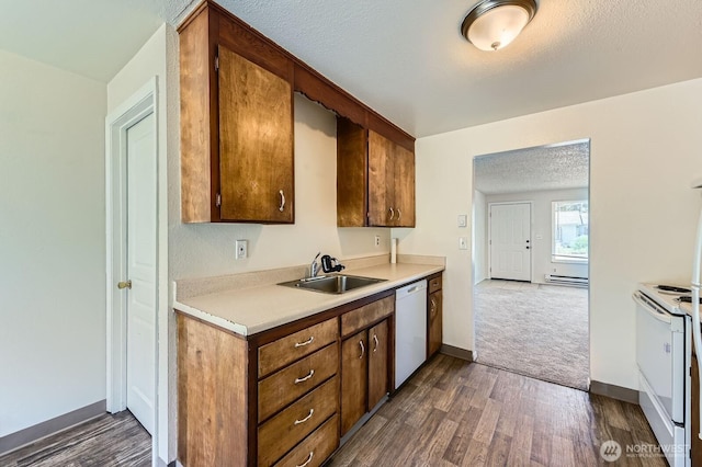 1700317009 16th Ave E, Spanaway, WA 98387 - kitchen with white appliances, dark wood-style floors, light countertops, a textured ceiling, and baseboard heating
