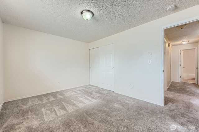 1700317009 16th Ave E, Spanaway, WA 98387 - carpeted spare room with a smoke detector and a textured ceiling