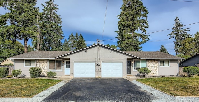 1700317009 16th Ave E, Spanaway, WA 98387 - ranch-style home with an attached garage, driveway, stone siding, and a shingled roof
