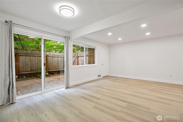 12211 SE 59th St Unit 61, Bellevue, WA 98006 - unfurnished room featuring light wood-style floors and recessed lighting