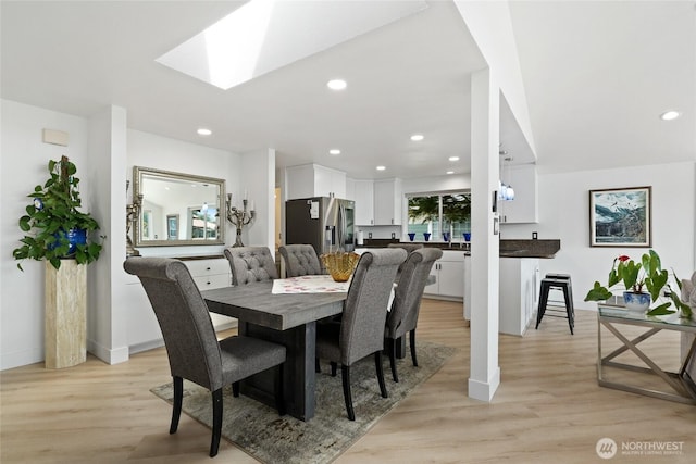 153 Swinomish Dr, La Conner, WA 98257 - dining room with light wood finished floors, recessed lighting, and a skylight