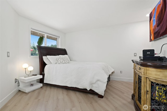 153 Swinomish Dr, La Conner, WA 98257 - bedroom featuring baseboards and wood finished floors