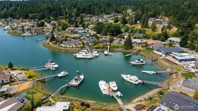 153 Swinomish Dr, La Conner, WA 98257 - aerial view of property and surrounding area with a large body of water and nearby suburban area