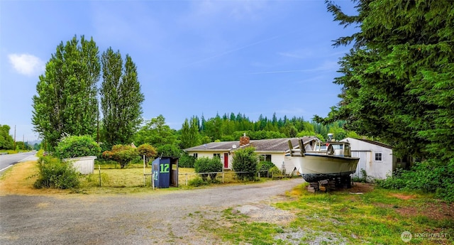 8739 F And S Grade Rd, Sedro Woolley, WA 98284 - view of front of house featuring driveway and a chimney