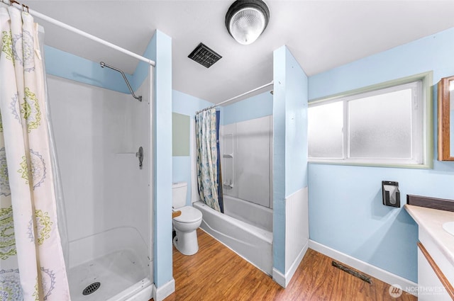 8739 F And S Grade Rd, Sedro Woolley, WA 98284 - full bath with wood finished floors, vanity, and shower / bath combo with shower curtain