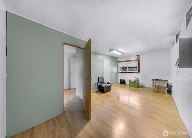 8739 F And S Grade Rd, Sedro Woolley, WA 98284 - living area with a textured ceiling and wood finished floors