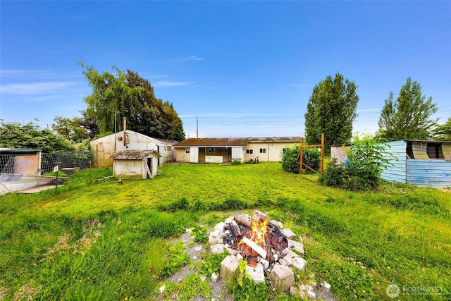 8739 F And S Grade Rd, Sedro Woolley, WA 98284 - view of yard featuring a fire pit and an outdoor structure