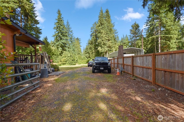 8031 Fir Tree Ln, Lake Stevens, WA 98258 - view of yard with a detached carport and driveway