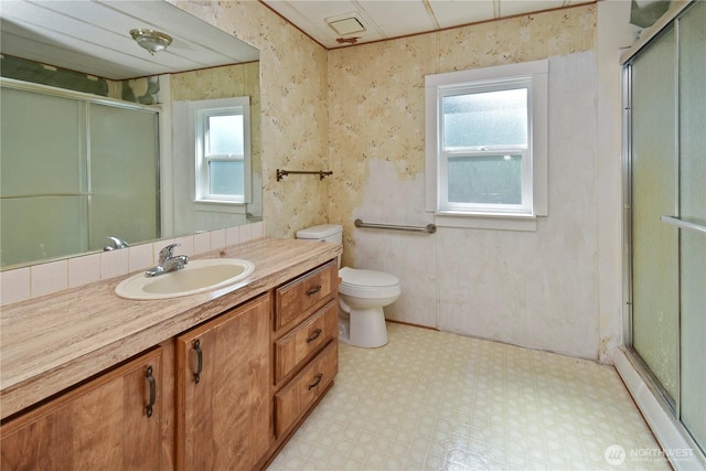 8031 Fir Tree Ln, Lake Stevens, WA 98258 - bathroom featuring tile patterned floors, a stall shower, vanity, and plenty of natural light